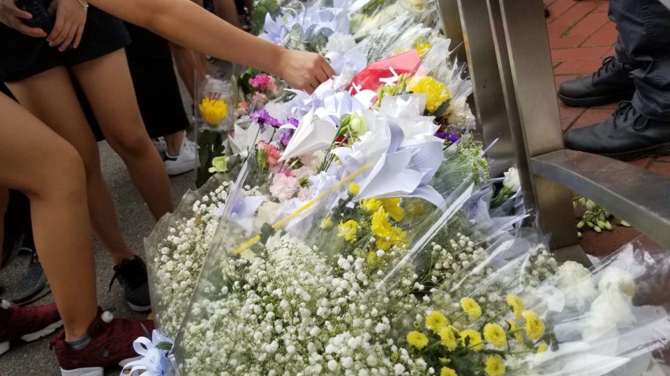 Hongkongers marching against controversial extradition law line up to leave thousands of flowers in honor of a protester who fell to his death on Saturday, June 15, at the Pacific Place mall. Photo by Vicky Wong/Coconuts Hong Kong