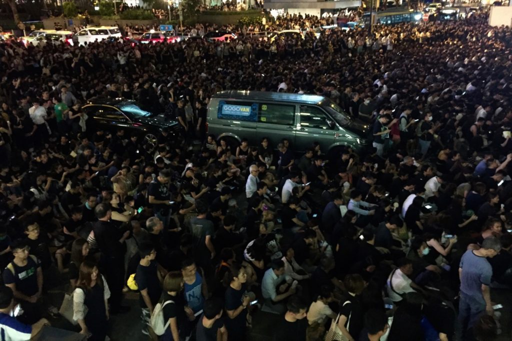 Enormous crowds spilled out of the designated protest area. Photo by Stuart White.