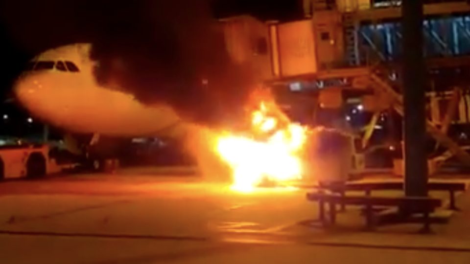 Video shared online shows a van on fire on the runway of Hong Kong International Airport. Screengrab via YouTube.