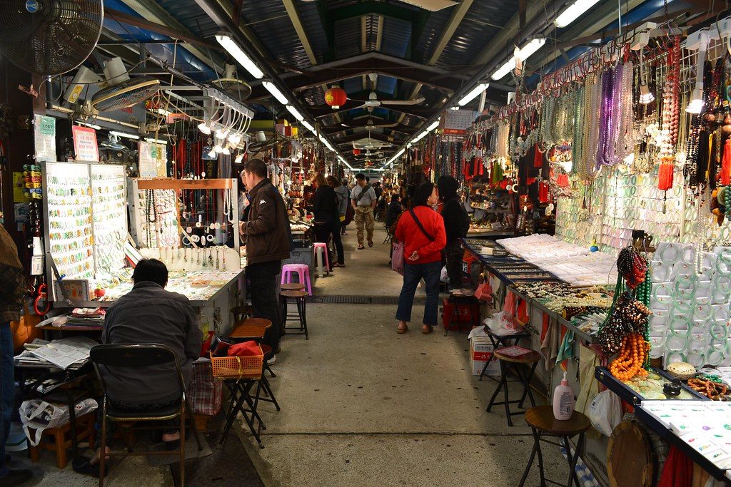 A row of vendors at Hong Kong's jade and pearl market in Kowloon. Photo via Flickr/David Boté Estrada.