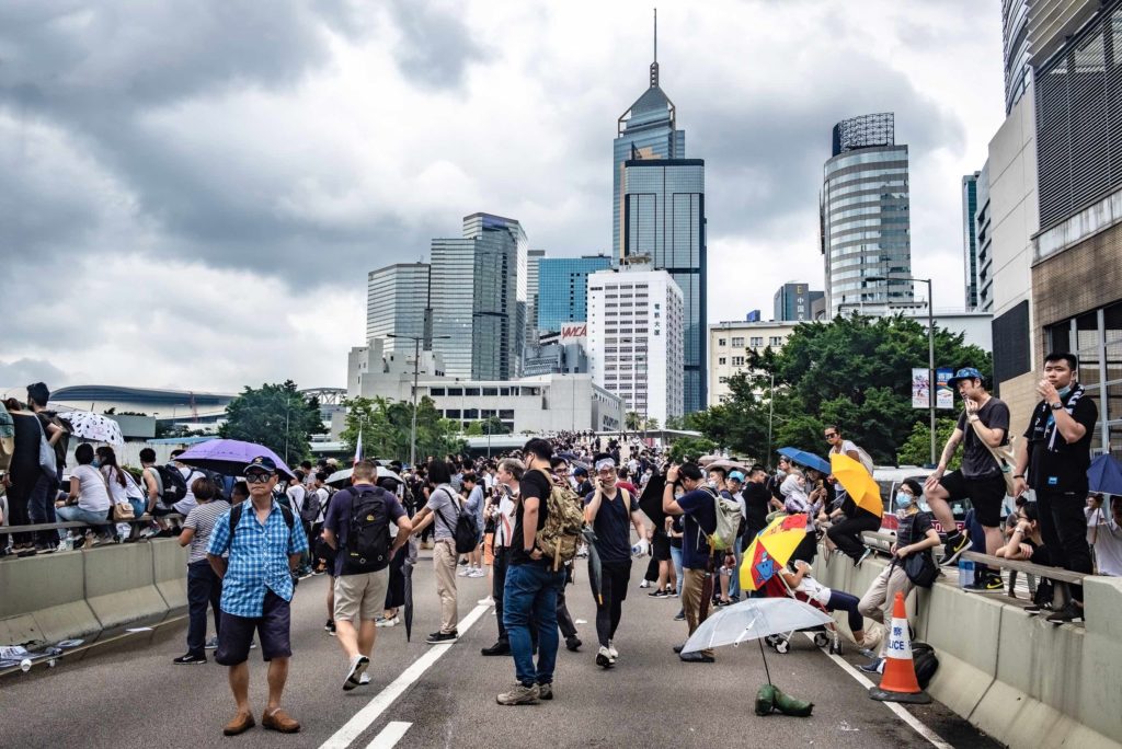 People gathering on Connaught Road Central during the extradition bill protest. Photo by Tomas Wiik.