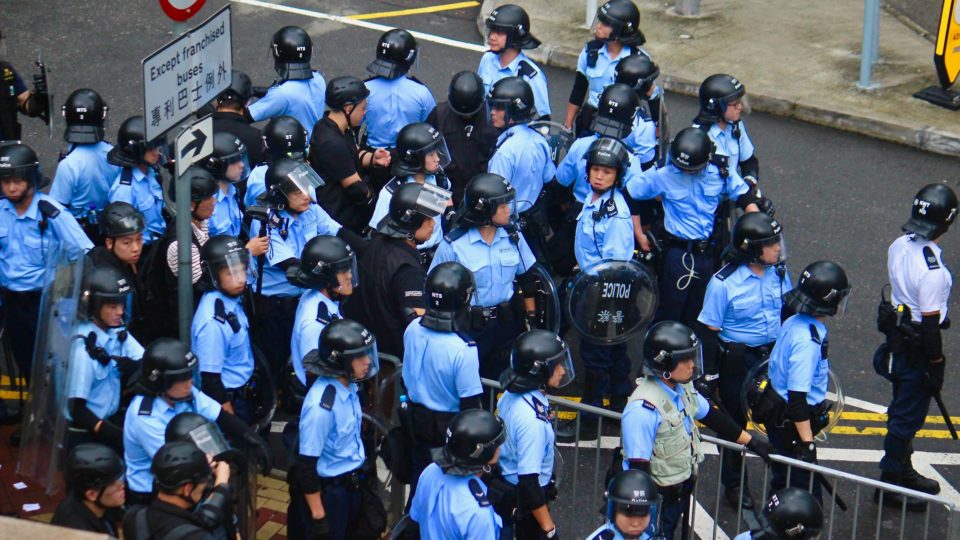 Police in riot gear during an extradition bill protest. Photo by Vicky Wong.