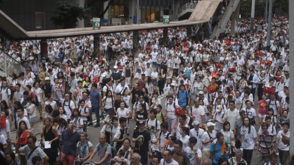 People protesting a controversial extradition bill head into Admiralty on Sunday, June 9. Photo by Vicky Wong.