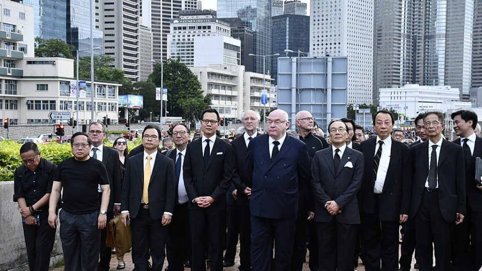 Lawmaker Dennis Kwok (fourth from left) and other members of the legal community stage a silent protest against a controversial extradition bill in Hong Kong earlier this month. Photo via VOA.