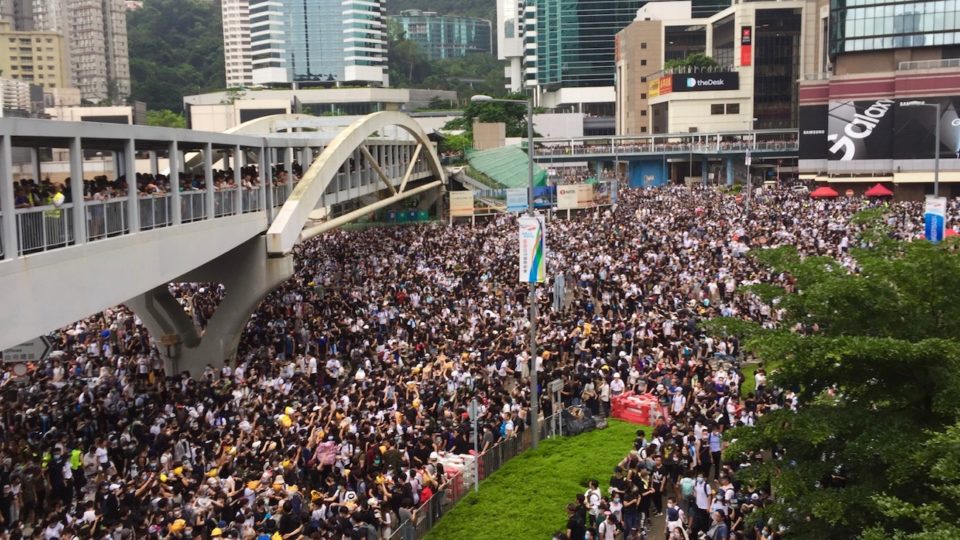 Thousands of protesters surround the LegCo complex in Hong Kong on June 12, 2019. Photo: Stuart White for Coconuts Media.