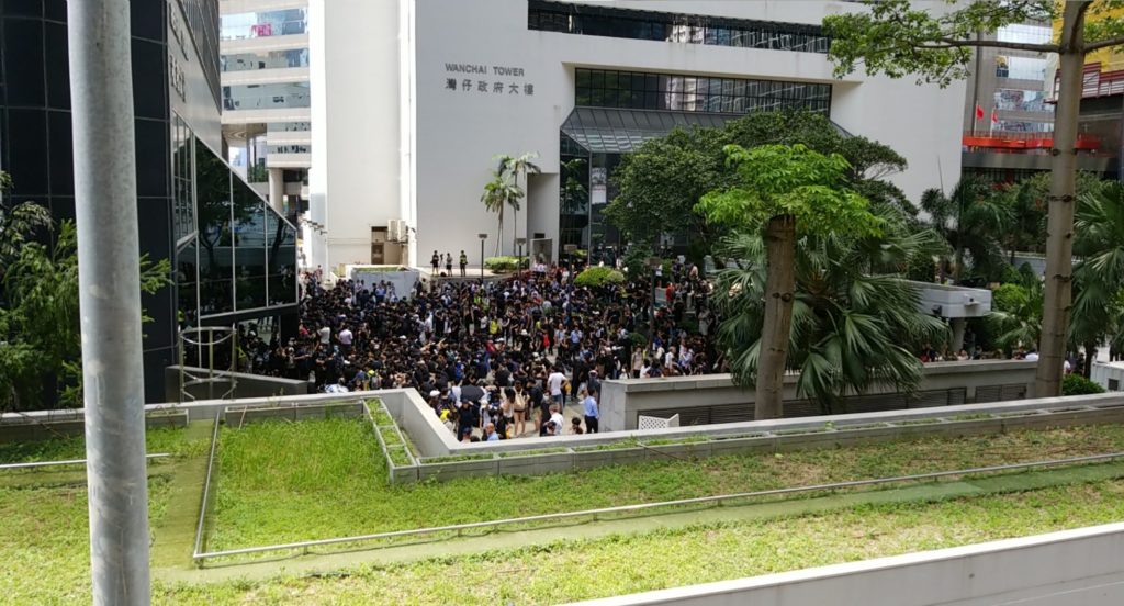 Protesters occupy the courtyard of Wan Chai tower today, as well as the lobbies of government offices in the area. Photo by Vicky Wong.