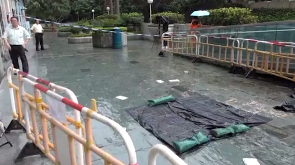 The scene where an elderly woman was killed by a falling metal part in Tsing Yi today. Screengrab via Apple Daily Video.