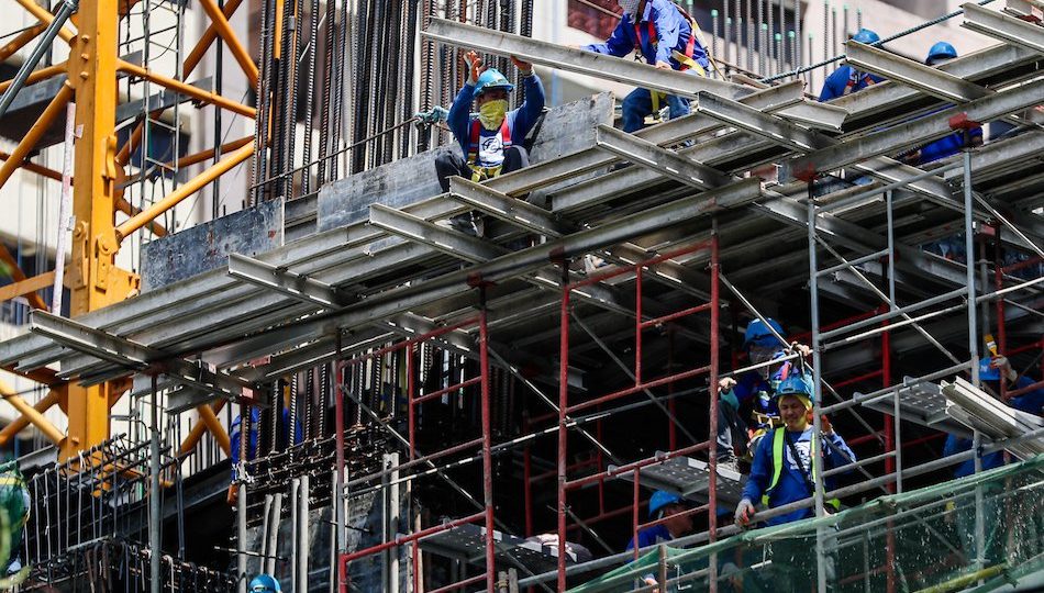Workers at a construction site in Pasig City. <i>Photo: Jonathan Cellona/ABS-CBN News</i>