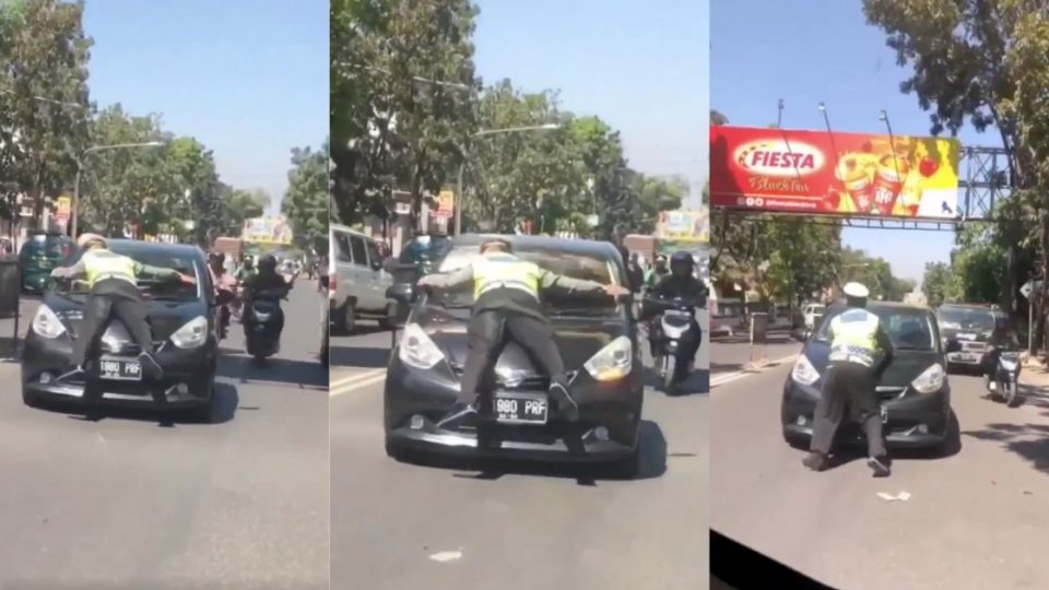 Recently, a video has gone viral showing a police officer lying face down and being carried on the hood of a car as it travelled quite a distance. Screenshot from Twitter/@altefalken