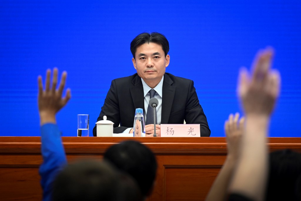 Yang Guang, spokesperson for China’s Hong Kong and Macau Affairs Office (HKMAO), answers questions concerning the ongoing protests in Hong Kong today. Photo via AFP.