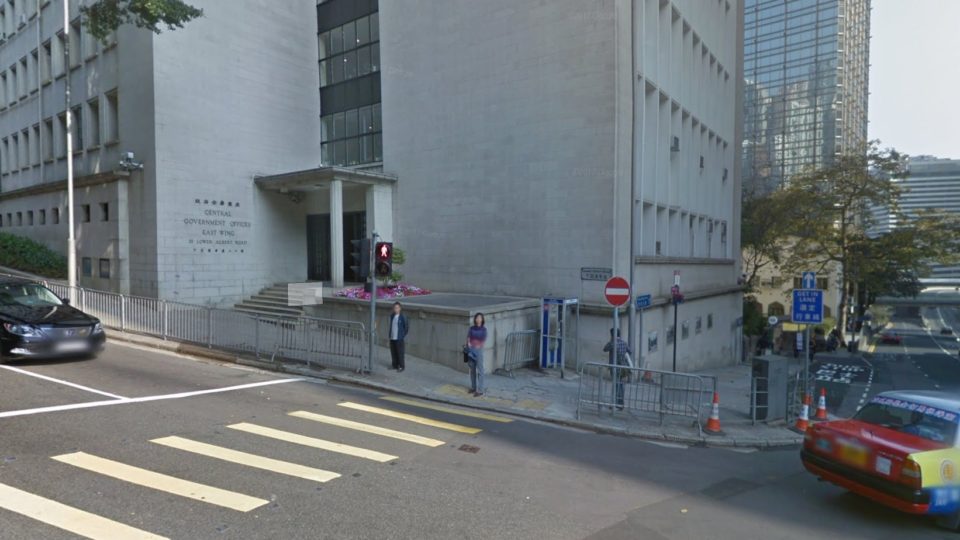 The phone booth outside a government building where a suspicious backpack sparked a bomb scare in Central today. Photo via Google Maps.