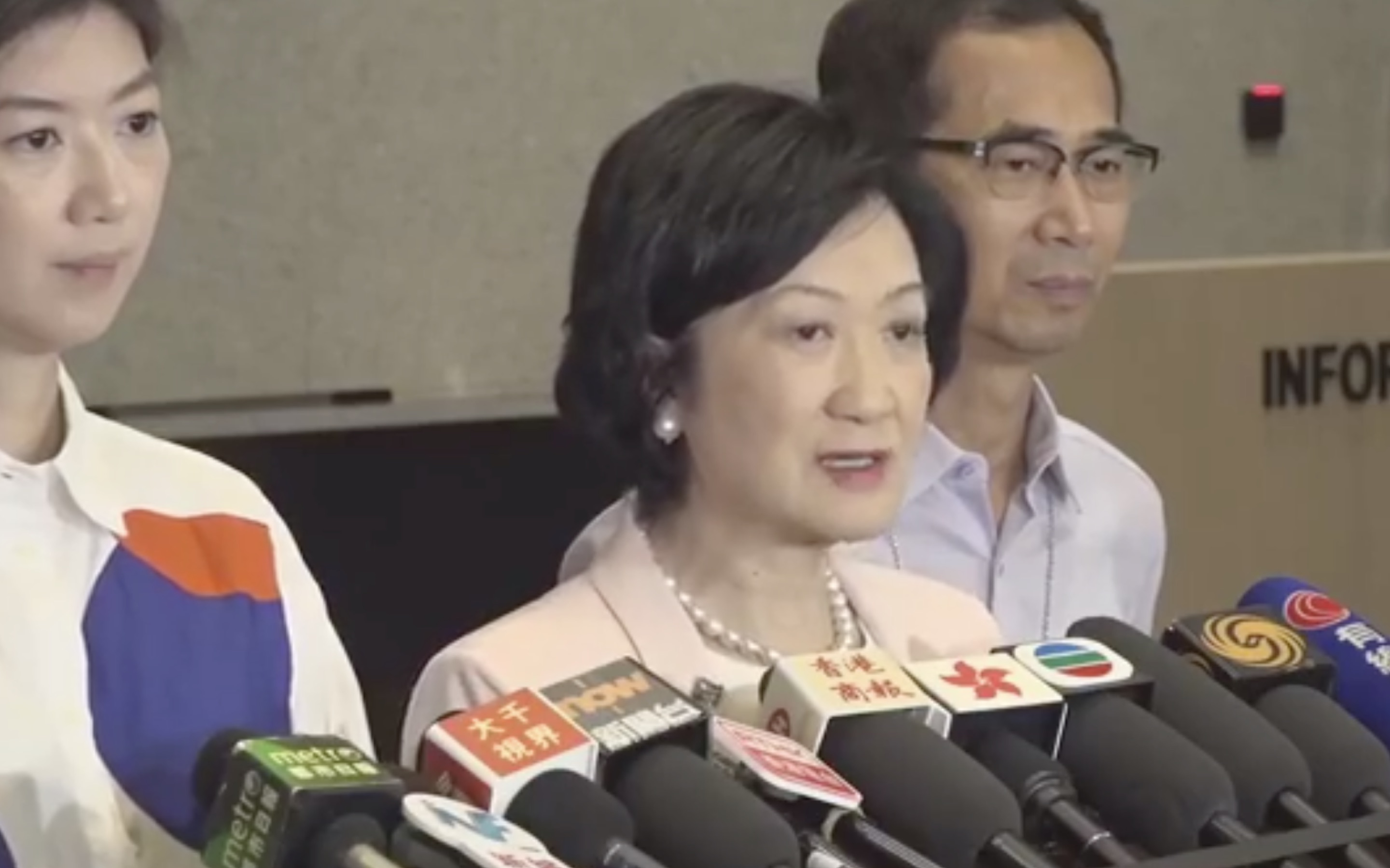 Pro-Beijing lawmaker Regina Ip tells reporters that she and her party the New People’s Party have suggested the government offer a cash handout to Hongkongers in next year’s budget. Screengrab via Facebook video.