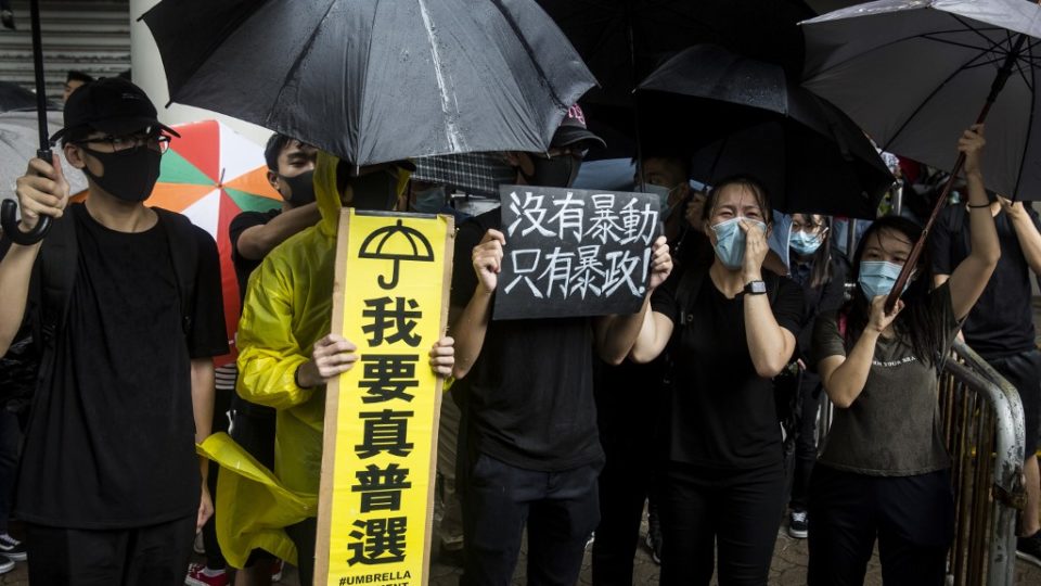 Demonstrators gather outside the Eastern district court in support of protesters who have been charged with rioting during recent clashes with police. Photo via AFP.