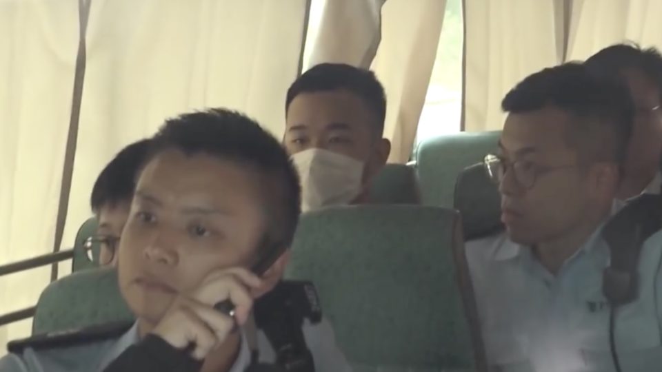 A 22-year-old student accused of allegedly biting off a police officer’s finger appeared in court today. Screengrab via Facebook video/RTHK.