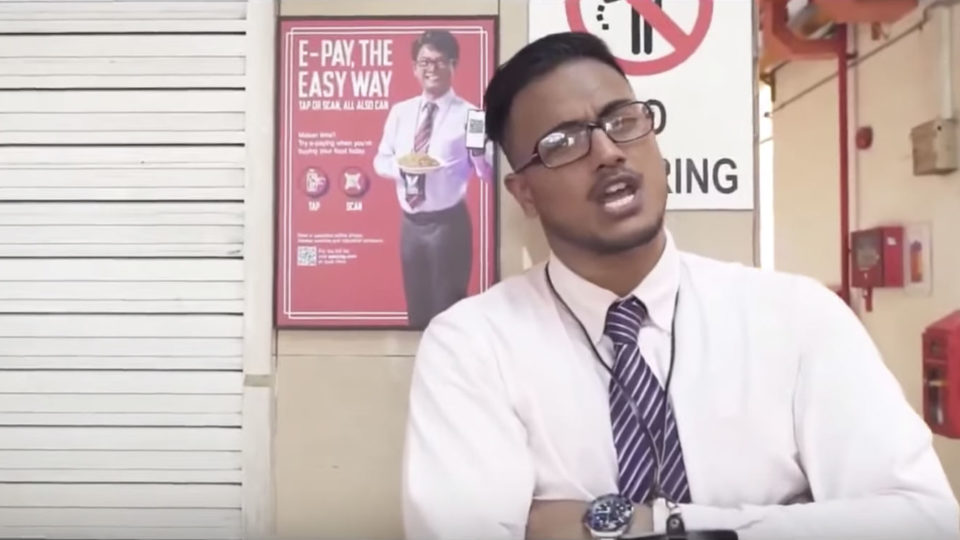 Screenshot of Subhas Nair in rap video made in response to controversial E-Pay ad. 