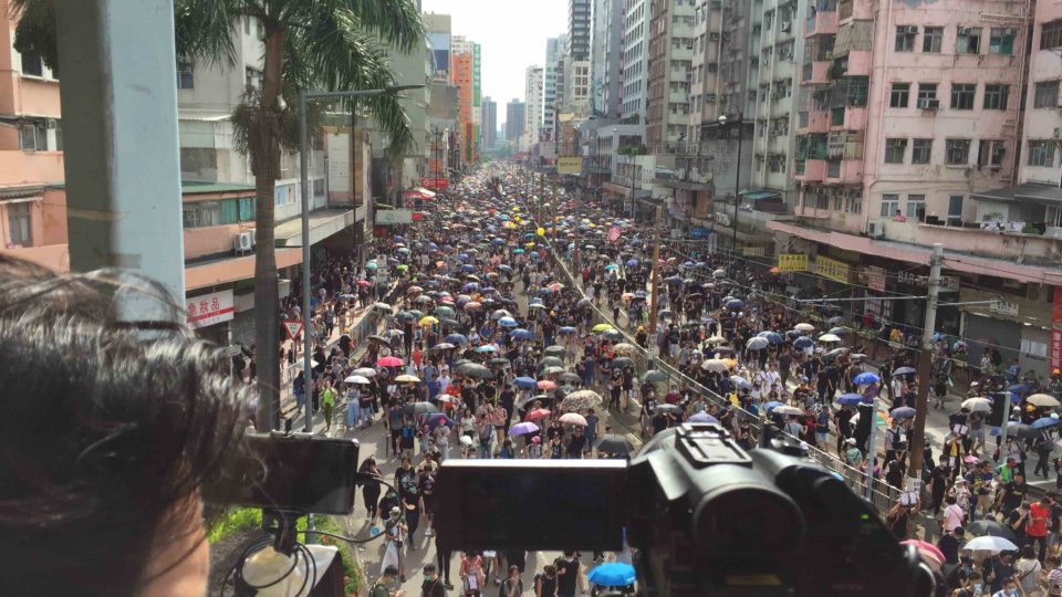 Thousands of protesters crowd Castle Peak Road during an unsanctioned protest in Yuen Long today. Photo by Stuart White.