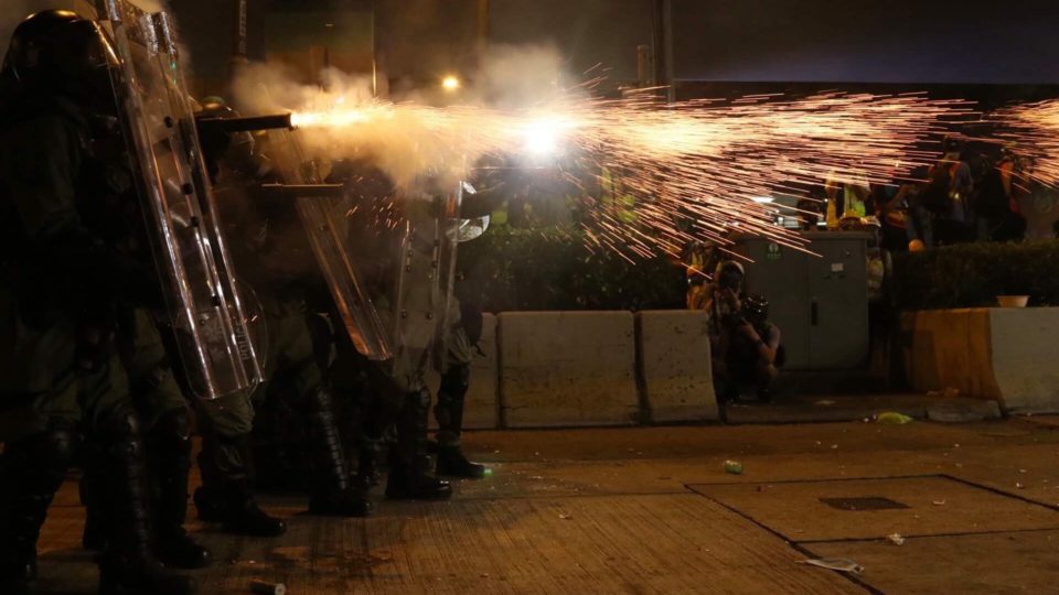 Police fire tear gas at violent protesters at an unsanctioned march on Hong Kong Island on July 28. Photo by Samantha Mei Topp.