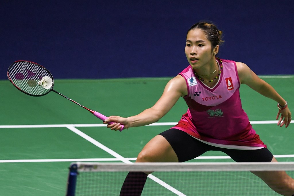 Thailand’s Ratchanok Intanon hits a shot against China’s Chen Xiao Xin during the women’s singles quarter-final match at the Thailand Open badminton tournament in Bangkok on August 2, 2019. (Photo by Chalinee Thirasupa / AFP)