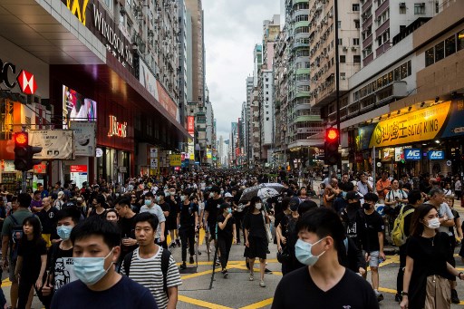 Protesters wearing black take part in a march in Mong Kok in Hong Kong on August 3, 2019. Photo: Isaac Lawrence/AFP