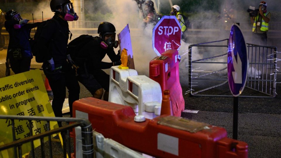 Protesters gather in the district of Causeway Bay in Hong Kong on August 4, 2019. – Riot police fired tear gas on August 4 at protesters on Hong Kong’s main island, the second consecutive night of unrest in a territory battered by weeks of anti-government rallies. (Photo by Philip FONG / AFP)