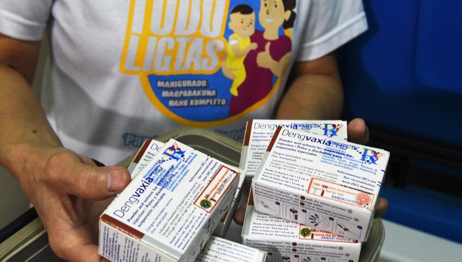A nurse shows boxes of the  vaccine Dengvaxia in Manila. The vaccine has been banned in the Philippines by the government. <i>Photo: Ted Aljibe/AFP</i>