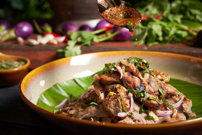 Grilled pork neck. Photo: Chalerm Thai