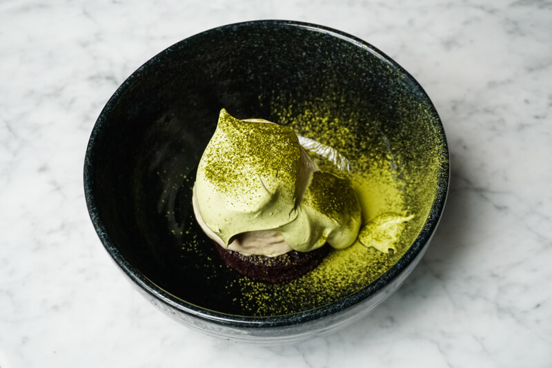 Vanilla Semifreddo and matcha cream on top of chocolate cake (THB170). Photo: Coconuts Media