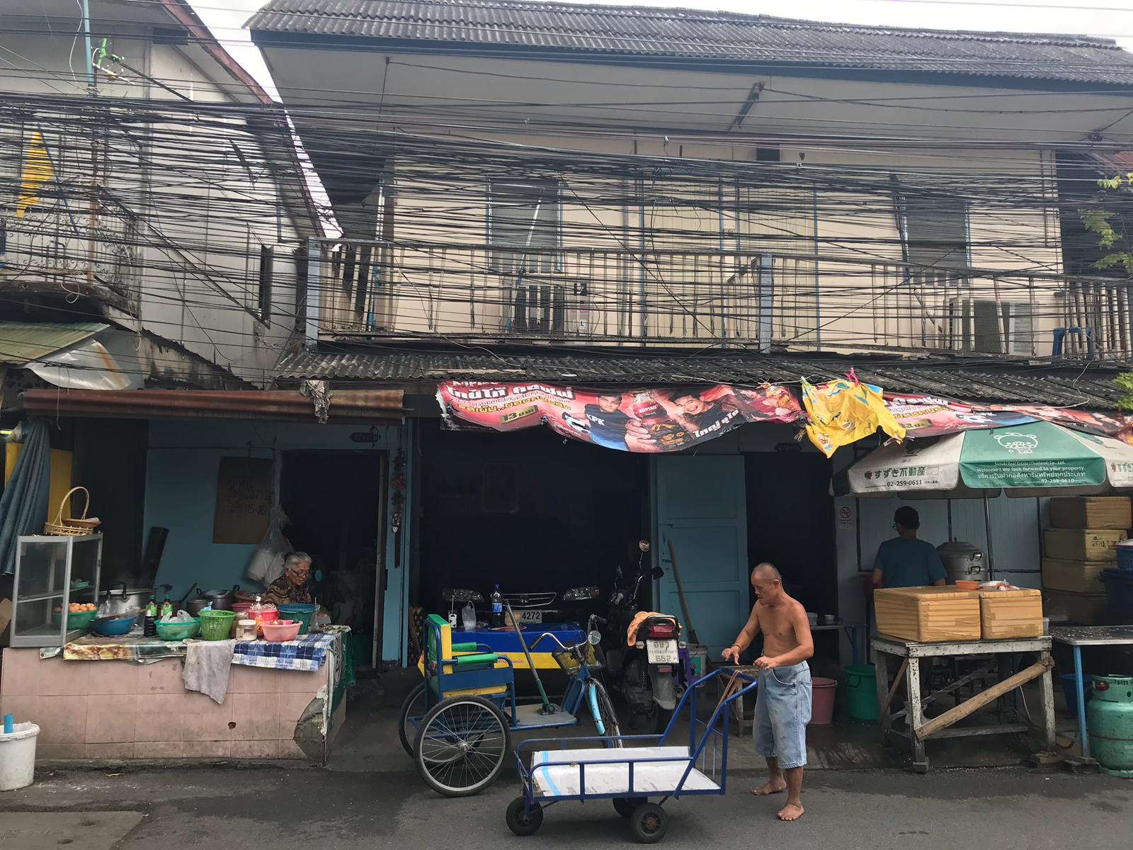 Khlong Toei native Sompong Gingachorn accepts his fate and has confidence the government will make good on promises to improve their lives. Photo: Coconuts