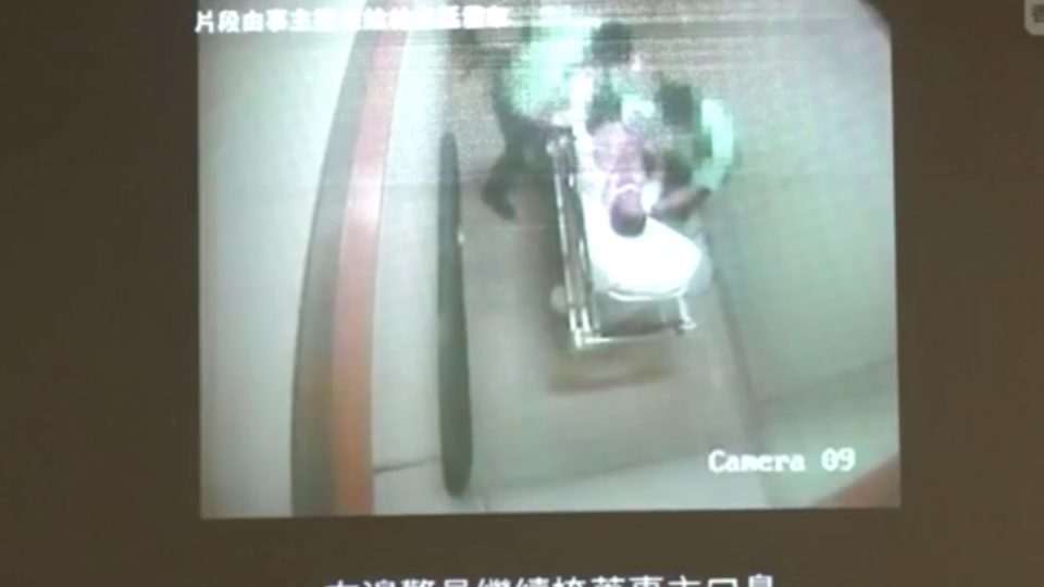 The Democratic Party show CCTV footage of an alleged assault by police against an elderly man who was arrested for assaulting a police officer during a drunken brawl in Sheung Shui in June. Screengrab via Facebook video/RTHK.