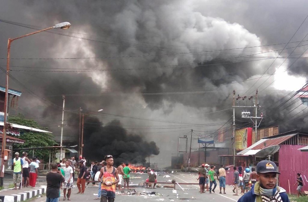 Protesters take to the street to face off with Indonesian police in Manokwari, Papua on August 19, 2019. Photo by AFP