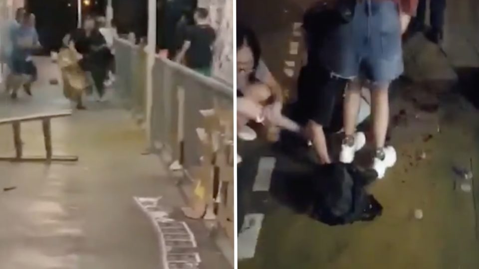 (Left) Video posted online shows the moment a woman flees after being attacked by a man in a blue shirt and wielding a knife. (Right) One of the injured is sitting on the sidewalk after being injured. Screengrabs via Facebook video and Twitter video.