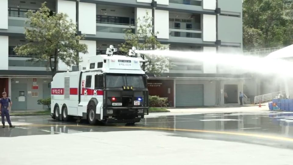 Police demonstrate the capabilities of a truck mounted with powerful water cannons intended for use in crowd control. Photo via RTHK livestream