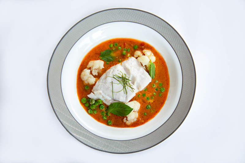 Coconut poached fish. Photo: COMO Shambhala/Singapore Airlines