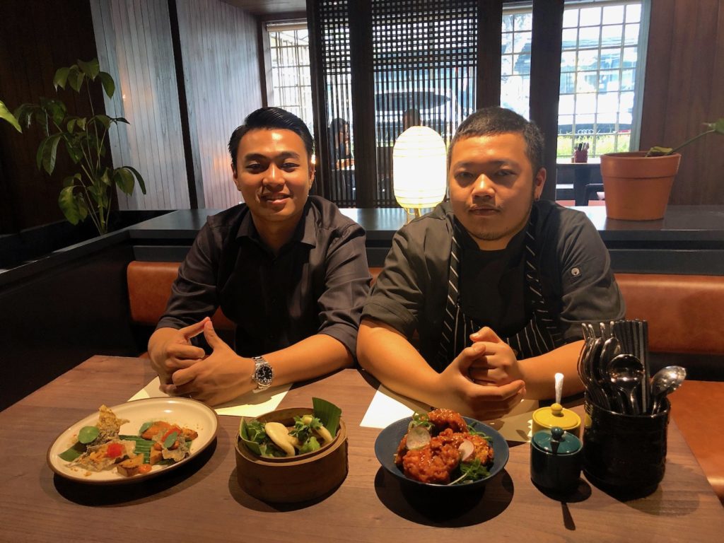 Broadway Group CEO William Ernest Silanoe (left) and Lei Lo's new head chef Jodie Adrianto posing with the new menu items. Photo: Nadia Vetta Hamid/Coconuts Media