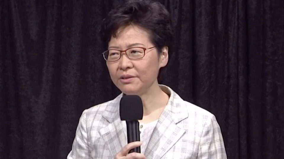 Carrie Lam addresses the crowd at a public dialogue in Wan Chai on Sept. 26. Screengrab via Facebook/Now News.
