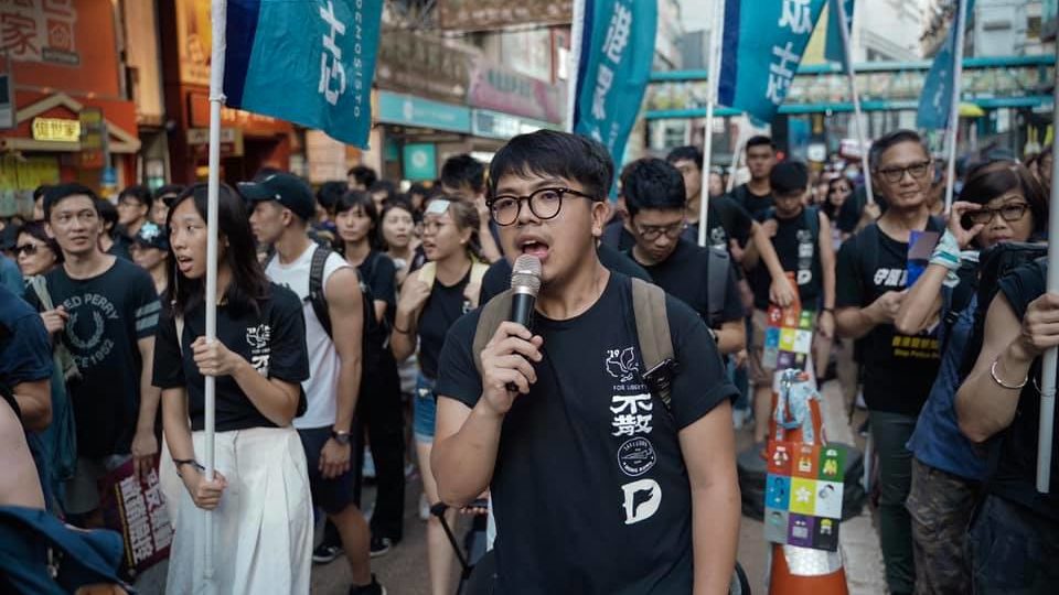 Demosisto Chair Ivan Lam participates in a march in Hong Kong on July 21. Photo via Facebook/Demosisto.