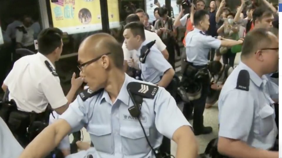 Police surround some protesters for disrupting MTR services during rush hour on September 2, 2019 at Lok Fu MTR station. Screengrab via RTHK video