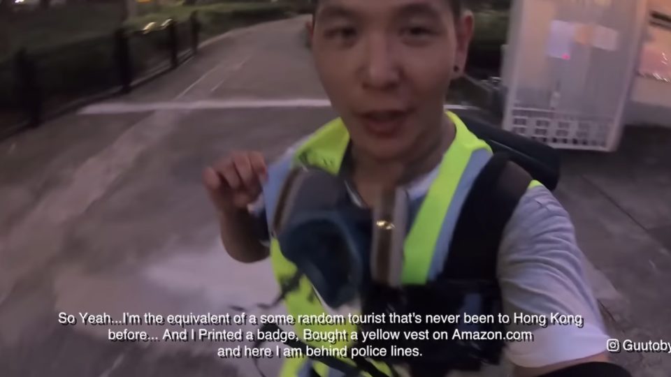 Toby Gu, a Canadian influencer faced backlash online after he posted a video of himself posing as a journalist to film a protest in Sha Tin in Hong Kong. Screengrab via YouTube.
