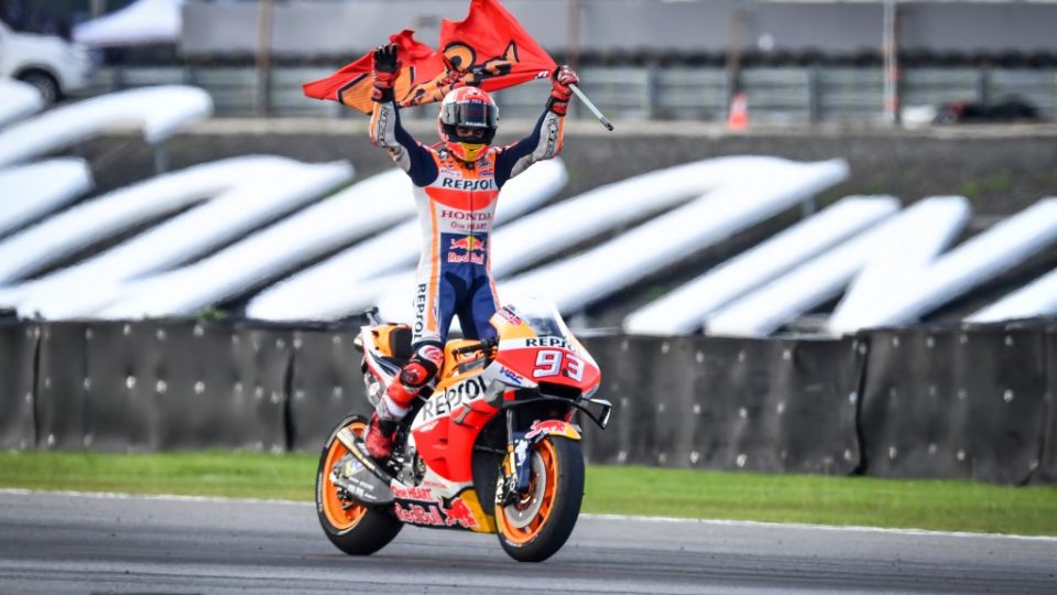 Repsol Honda Team Spanish rider Marc Marquez celebrates on the track after winning the MotoGP race for the Thailand Grand Prix at Buriram International Circuit in Buriram on October 6, 2019. Photo by Lillian Suwanrumpha / AFP