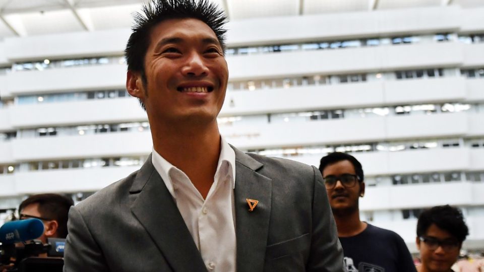 Thanathorn Juangroongruangkit, billionaire leader of opposition Future Forward Party, arrives to face his first hearing over disputed media shares at the Constitutional Court in Bangkok on October 18, 2019. Photo by Lillian Suwanrumpha / AFP