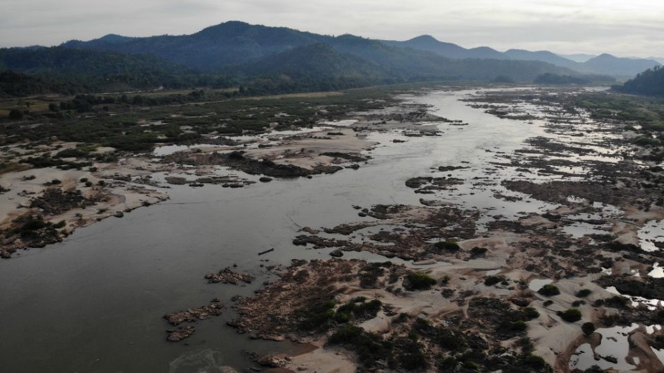 This aerial photo taken on October 31, 2019 shows Mekong River in Pak Chom district in the northeastern Thai province of Loei with Laos side seen at left. Photo by Lillian Suwanrumpha / AFP