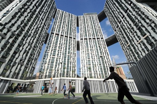 View of the Pinnacle@Duxton from the basketball court. Image: Roslan Rahman/AFP