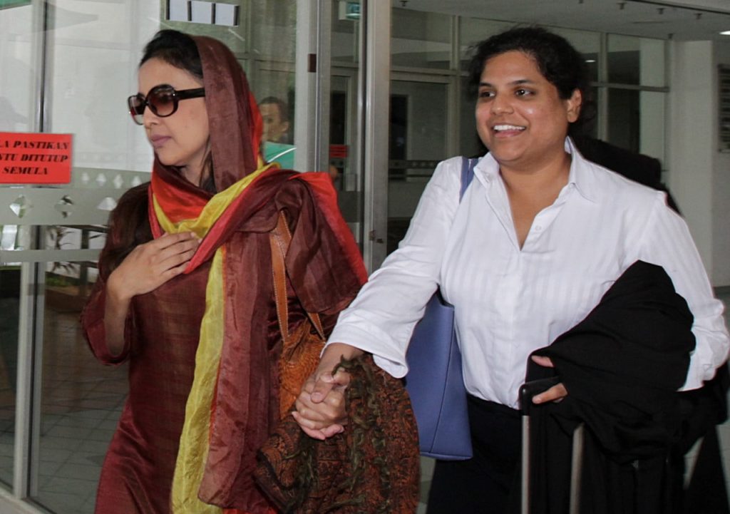 The accused, on the left via Twitter