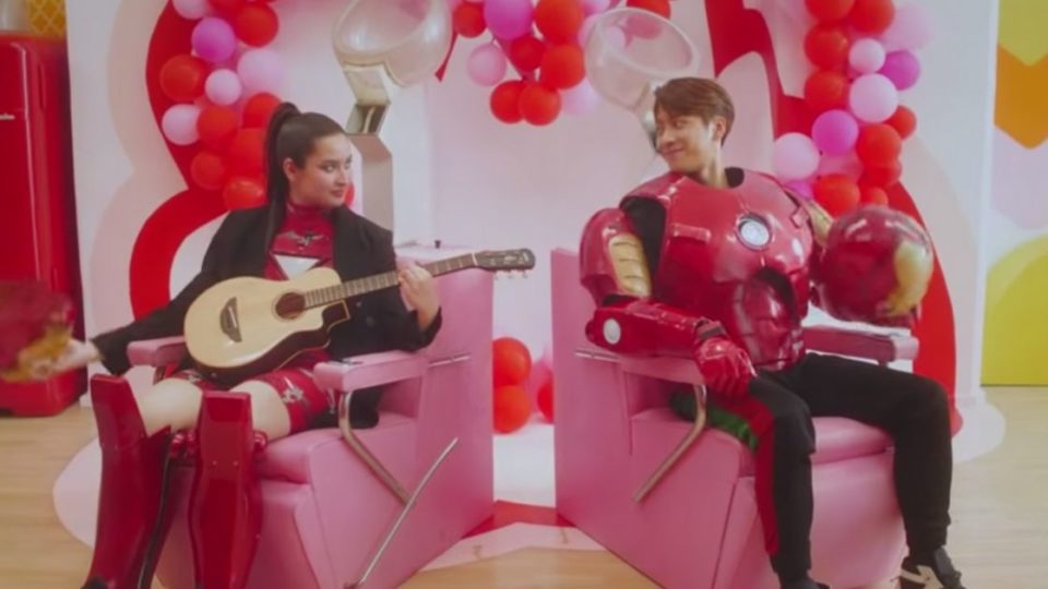 Stephanie Poetri and Jackson Wang don the Iron Man costume in the music video for ‘I Love You 3000 II’. Screenshot from Youtube/88rising