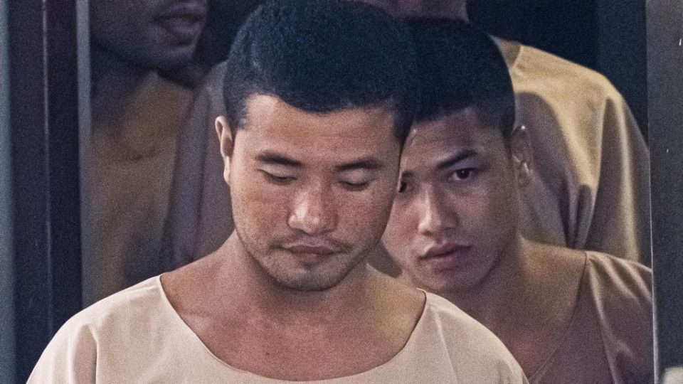 Zaw Lin, at center, and Win Zaw Tun, at right, leave the court on Aug. 29, 2019, in Nonthaburi province after the verdict regarding their conviction for murdering two British backpackers on the holiday island of Koh Tao. Photo: Mladen ANTONOV / AFP