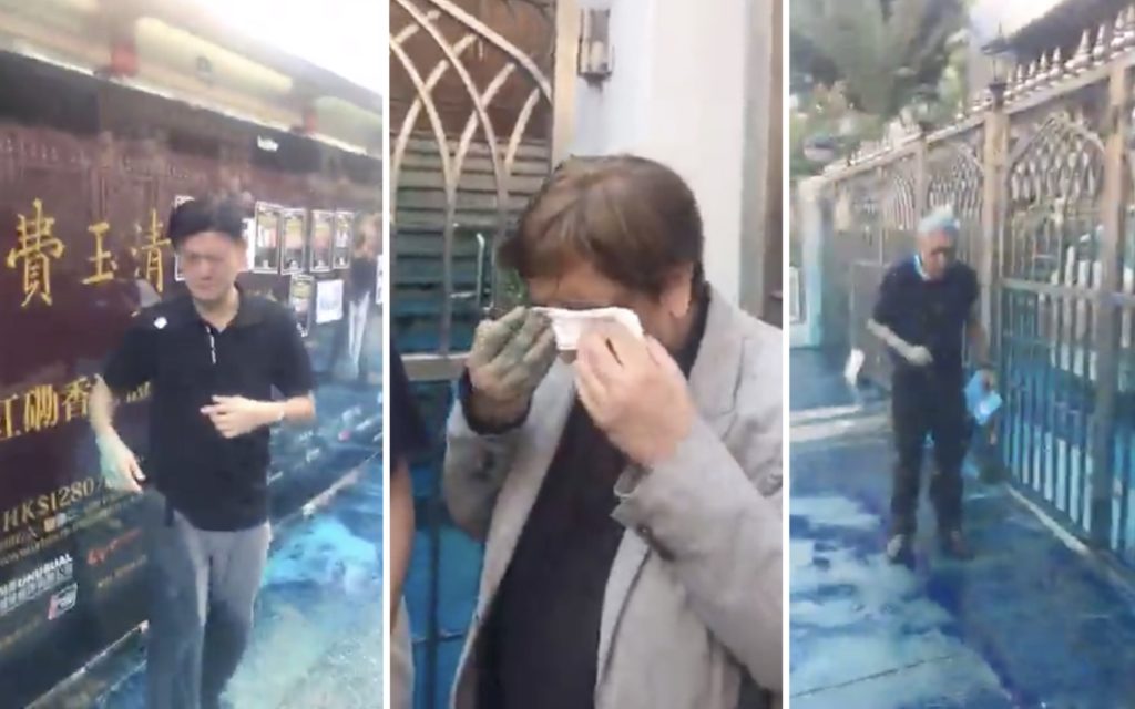 (From left to right) Jeremy Tam, Philip Khan, and Mohan Chugani after a water cannon fired directly at them, dousing them in water laced with blue dye and a pepper solution. Screengrabs via Facebook/Jeremy Tam.