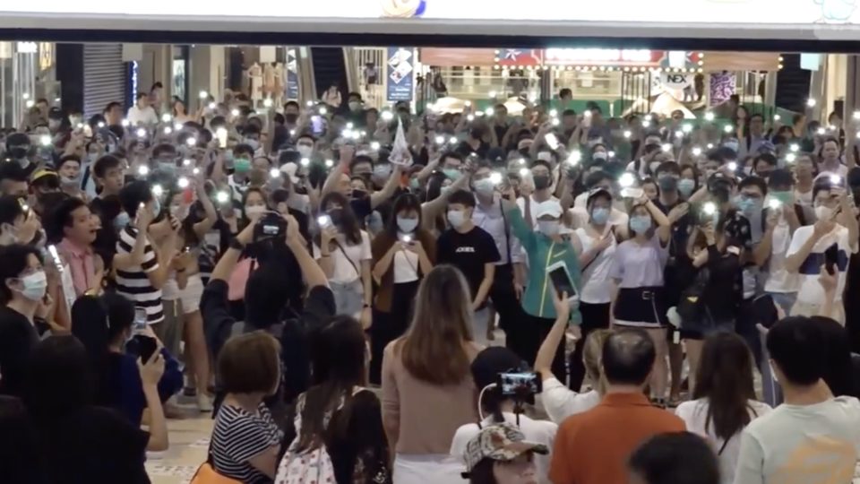 Protesters gather in MOSTown Mall in Ma On Shan in response to the arrest of five mall staff who tried to prevent riot police from charging into a mall. Screengrab via Facebook/RTHK video.