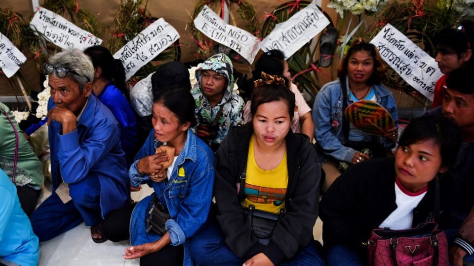 Members of a farmers group arrive in October at the Ministry of Industry in support of certain pesticides during a government committee hearing in Bangkok. Photo: Lillian Suwanrumpha / AFP