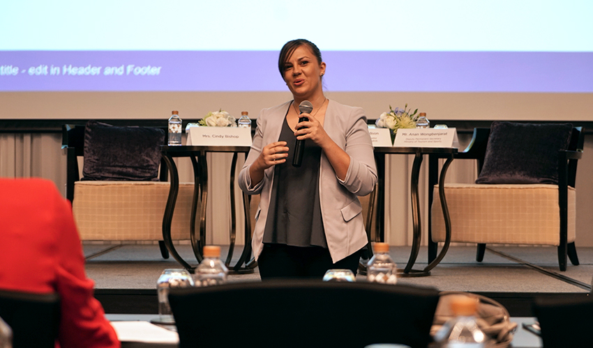 31-year-old Emma Thomas speaking at the opening of a two-day seminar to educate those on the front lines on how to improve their handling of assault victims. Photo: Coconuts