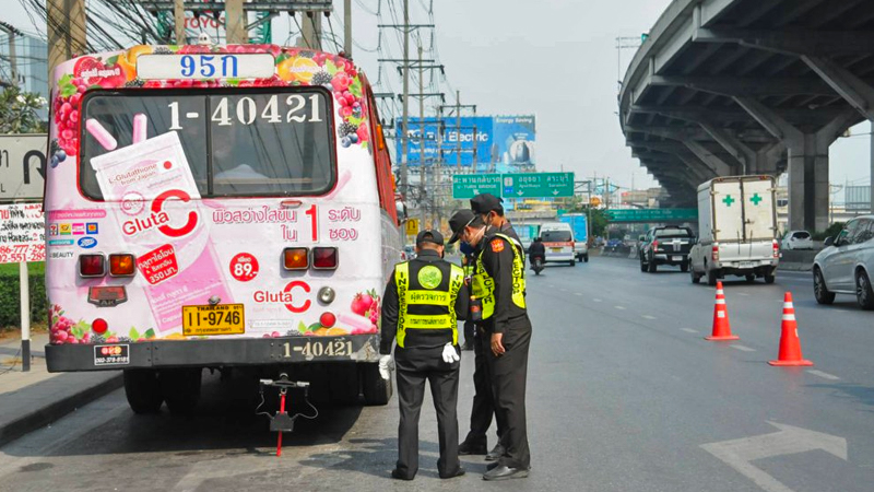 Land transport officials spot-test a bus for emissions. Photo: Land Transport Department 

